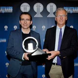 Iveco Brand President Pierre Lahutte (left) accepts Truck of the Year 2016 award from jury Chairman Gianenrico Griffini