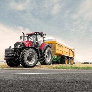 The Case IH Optum 270 CVX tractor with trailer