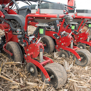 The new 2000 series Early Riser® planter cast iron row unit stands up to high speeds and tough conditions