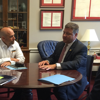 Scott Harris, vice president – North America, CASE Construction Equipment, meets with Congressman Bill Shuster