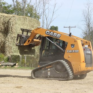 Greater lifting capacity, more speed and lower ground pressure helps Michigan farmer keep ahead.