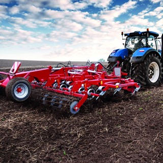 New Holland Tractor with tillage implement