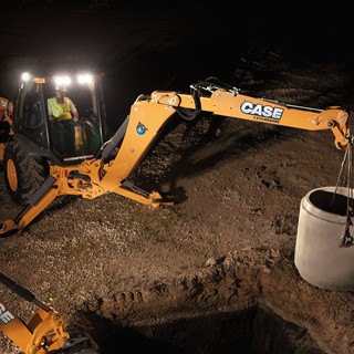 Backhoes can make money at night just as well as they can during the day
