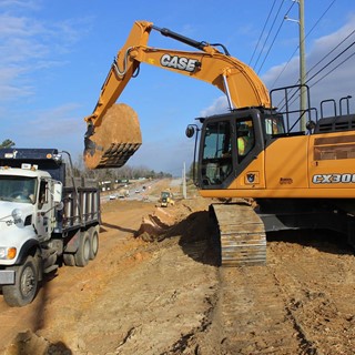 New CASE CX300D Digs Into Road Widening Project for Reeves Construction