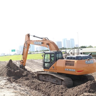 Excavator Hydraulics and Fuel Efficiency Stand Out for Florida Highway Contractor and Materials Producer