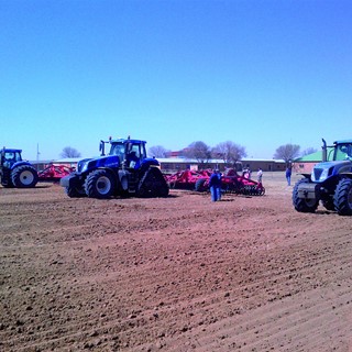New Holland training camp in South Africa, here with a range of T8 tractors, including the SmartTrax version (centre)