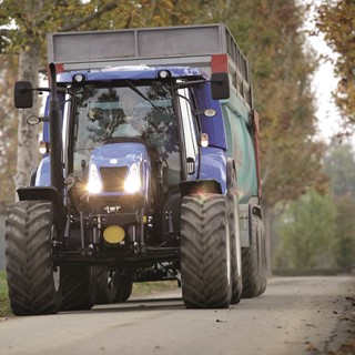 New Holland T6 Methane Power tractor conducting high speed transport