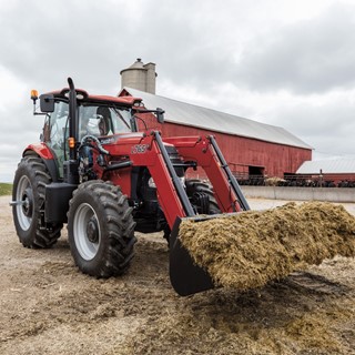 Case IH Puma 165 carrying out loader work