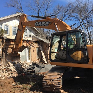 OCT Equipment Donates CTL and Excavator to Home Demolition for Korean War Veteran