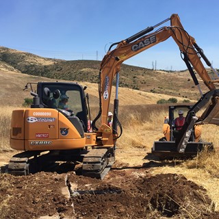 Team Rubicon volunteers training with an Excavator at San Diego National Wildlife Refuge