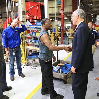 U.S. Senator Bob Casey greets employees during a New Holland plant tour