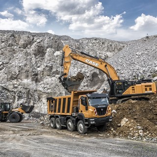 A CASE 1021G Wheel Loader and a CX750D Excavator