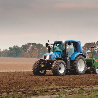 New Holland T6 Methane Power tractor undertaking field activities