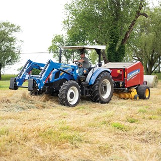 WORKMASTER Utility tractor with RF Fixed Chamber Round Baler