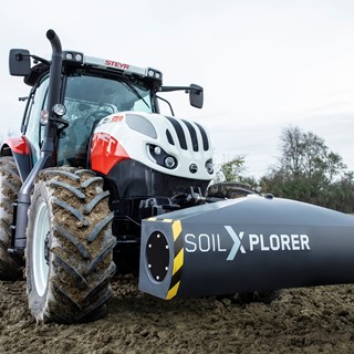 A STEYR tractor using SoilXplorer: real-time soil sensing systems with automatic implement working parameter adjustment