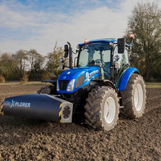 A New Holland tractor with SoilXplorer: real-time soil sensing systems, automatic implement working parameter adjustment