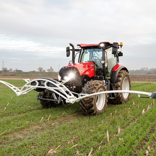 A Case IH Tractor with CropXplorer: a biomass sensing package to  accurately calibrate the application of fertilizer