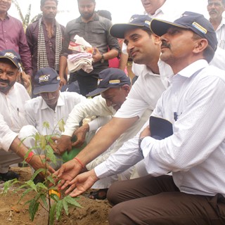 Villagers plant saplings at the inauguration ceremony of CNH Industrial’s Water Conservation CSR project