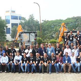 Representatives from CASE Construction Equipment with guests of Made in India event