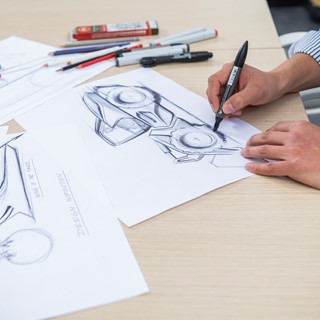Hand sketching is used in the inital stages to provide a plurality of design ideas.jpg