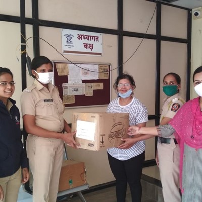 Dropping off donation of sanitary supplies at the Pune Chakan police station
