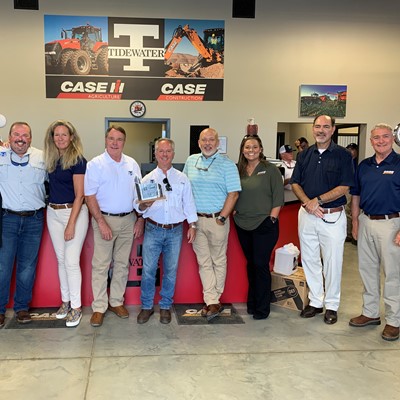 CASE and Tidewater officials join with local dignitaries to celebrate the opening of the new facility in Enterprise.jpg