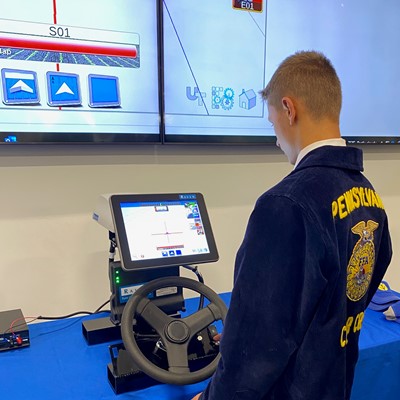 Cedar Crest FFA members check out the simulator s display