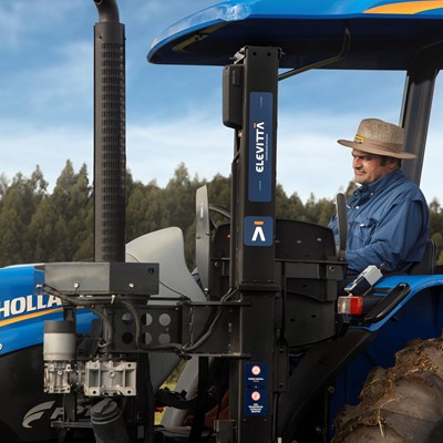 Farmer Fernando Dalmolin operating the accessible tractor mobile armchair device