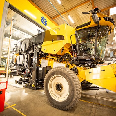 New Holland combine entering the in line test booths