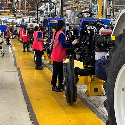 Women on the production line at the Greater Noida Plant in India