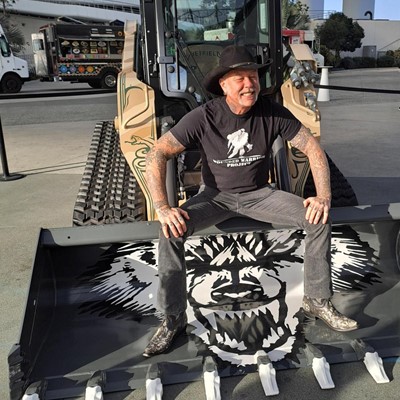 Metallica frontman James Hetfield with the special edition CASE compact track loader