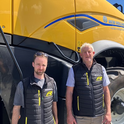 John Clark and son Matthew with the New Holland FR780 Forage Cruiser