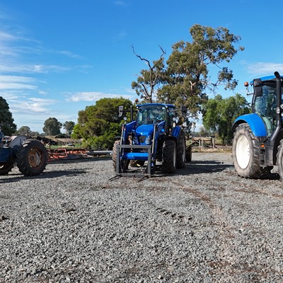 Tracing tractor tech across generations from a heritage Ford 2000 Offset to fuel efficient New Holland workhorses