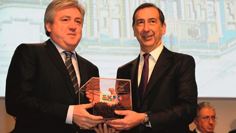 Carlo Lambro  receiving a symbolic sod of soil