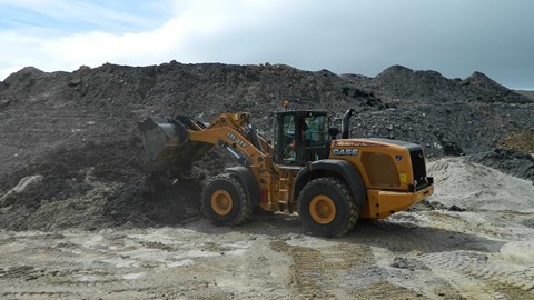 Case 1021F Wheel Loader moving aggregate