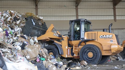 Case 721F wheel loader working at a waste management facility
