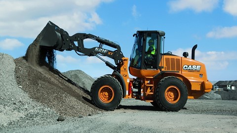 Case 621FXT wheel loader moving aggregate