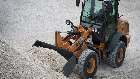 Case 221F Case compact wheel loader moving aggregate