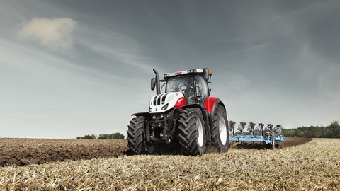 Steyr 6300 Terrus CVT with 7 furrow plough