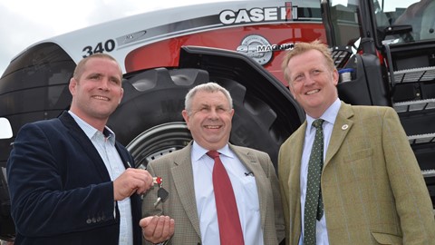 Bob Vaughan (centre) being presented with keys from Phil Vickery (left) with Cheffins auctioneer Bill King (right)