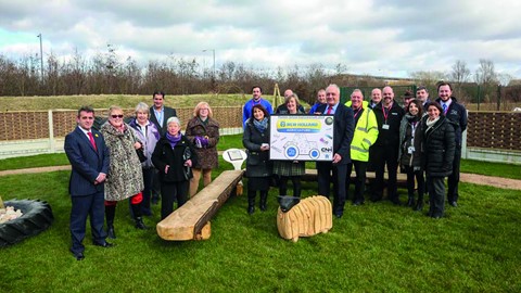 New Holland with the Pioneer School's garden