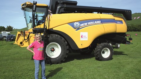 Judi finishes 174-mile journey on a New Holland CX5080 Combine Harvester for cancer charity