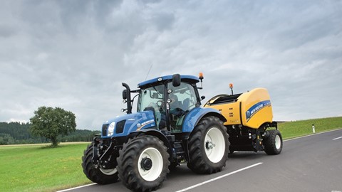 New Holland Roll Belt 150 CropCutter on the Road