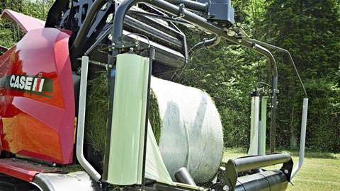 Case IH RB 544 Fixed Chamber Round Baler SilagePack in the Field