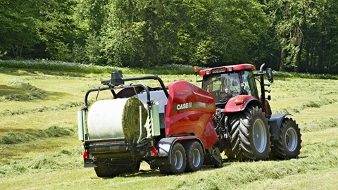 Case IH RB 544 Fixed Chamber Round Baler SilagePack in the Field