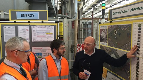 Employees discussing World Class Manufacturing at the San Mauro Plant