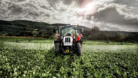 Steyr Multi Tractor spraying