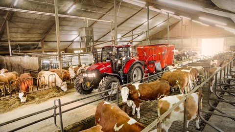 Case IH Luxxum Tractor with feeder wagon