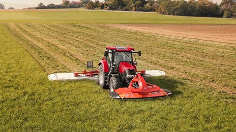 Case IH Maxxum Multicontroller Tractor with a triple mower