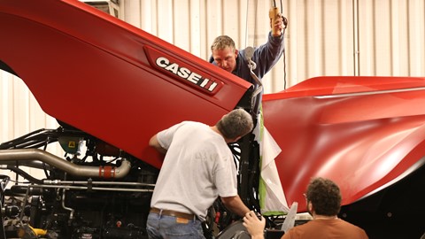 Fixing the hood section into place for the Case IH Magnum Autonomous Concept Tractor
